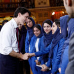 Prime Minister Trudeau meets with the Afghan Girls' Robotics Team at the Library of Parliament. Since 2015, UU has supported educational initiatives for Afghan girls, primarily through the Digital Citizen Fund (DCF), which organizes the robotics team and provides digital learning opportunities for young women.